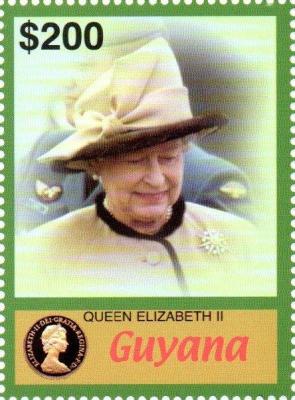2006. Queen-Elizabeth-II-Wearing-Black-Edged-Fawn-Jacket-and-Hat.jpg